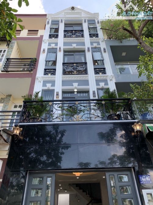 Bán nhà mặt tiền Lê Minh Xuân -Vân Côi, P7 Q.Tân Bình (4.5*16m) 4 lầu thang máy giá 15.9Tỷ