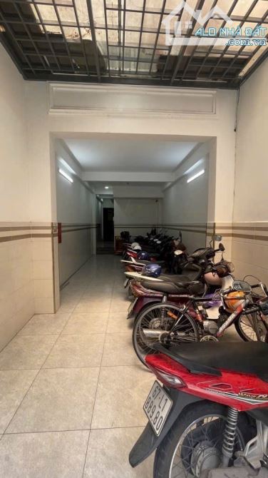 Căn hộ dịch vụ full nội thất 11PN 7 tầng dòng tiền 50tr Tân Quy quận 7 - 1