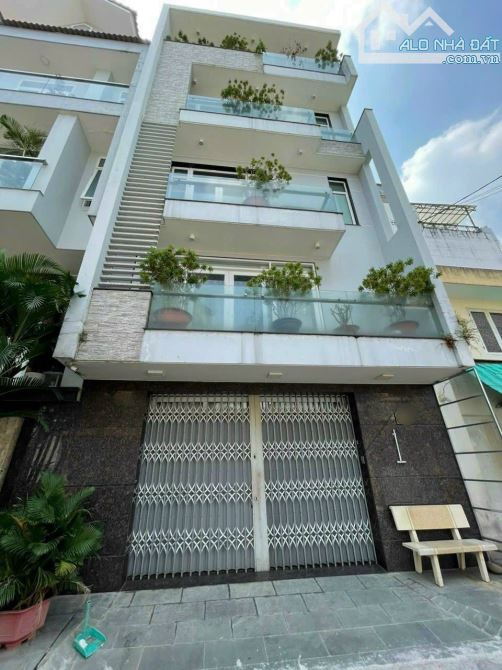 BÁN NHÀ HẺM 127 NI SƯ HUỲNH LIÊN P.10 TÂN BÌNH - HXH 10M CÓ VỈA HÈ - DT 5X20M - 3 LẦU - 1