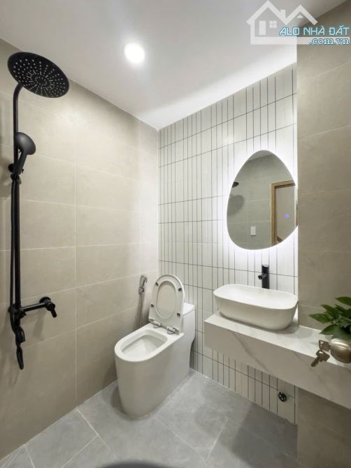 Bán nhà 4 tầng, 40m2, hẻm xe hơi, đường Nguyễn Văn Đậu, P5, Bình Thạnh. Sổ hồng riêng - 2