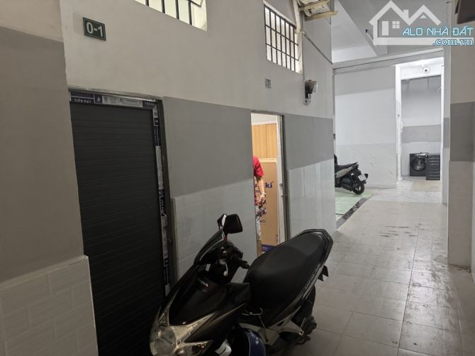 BÁN BUILDING NGAY KHU PHÂN LÔ ĐỒNG BỘ LÝ CHIÊU HOÀNG DTSD 409M2 KẾT CẤU 7 TẦNG CÓ HẦM - 4