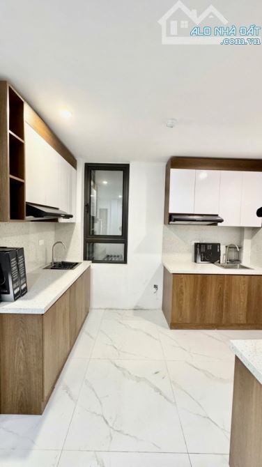 VŨ NGỌC PHAN ĐỐNG ĐA - TÒA CCMN 7 TẦNG THANG MÁY - S 74M2 MẶT TIỀN 4.6M, NHỈNH 18TỶ - 4