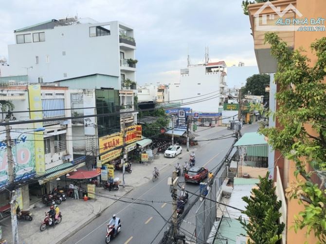 Mặt tiền Nguyễn Văn Nghi P.7 GV, 5 tầng 105m2, sổ vuông công nhận đủ - 1