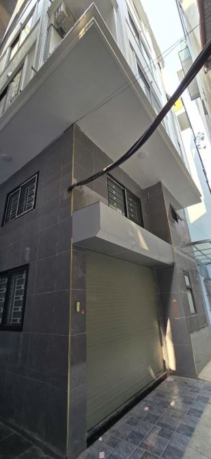 Bán nhà Thái Hà - 7 tầng thang máy kính - ô tô đỗ gần - giá 12.5 tỷ - 10