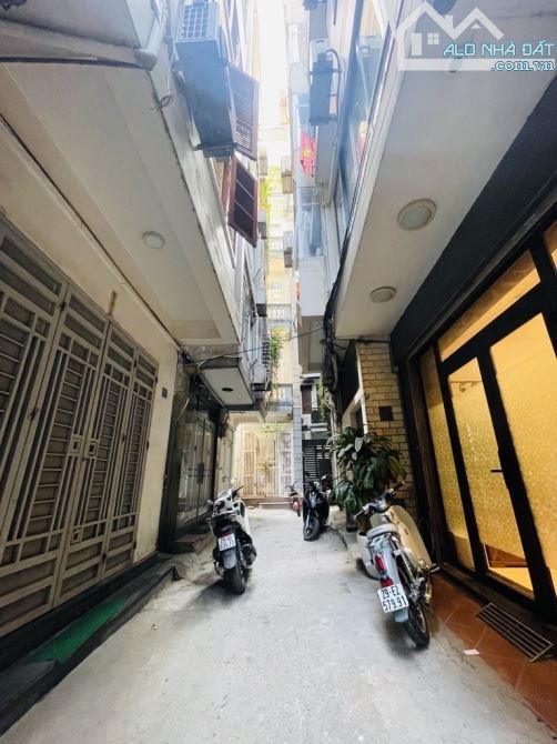 BÁN NHÀ -PHỐ AN TRẠCH-HÀO NAM-5 TẦNG DÂN XÂY LÔ GÓC 3 MẶT THOÁNG Ô TÔ ĐỖ CỬA - 1
