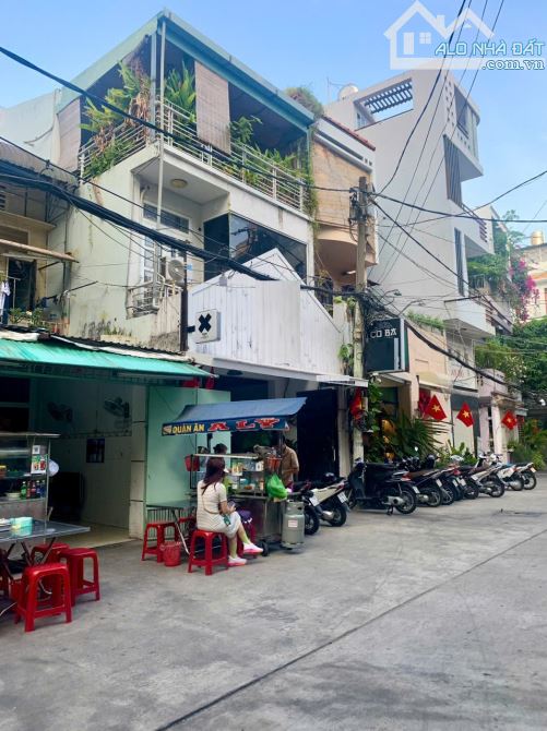 Nhà HXH Ngay mặt tiền Nguyễn Bỉnh Khiêm & Lê Duẩn, P. Bến Nghé, Q.1.DT:5x20, 1tr2l. - 2