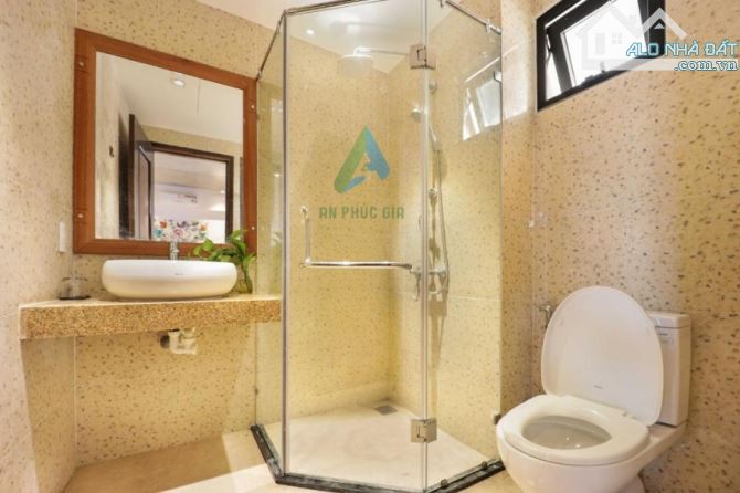 BÁN KHÁCH SẠN 8 TẦNG ĐƯỜNG LÊ VĂN HIẾN, DT 180m2, CÓ HỒ BƠI, GIÁ ĐẦU TƯ - 1