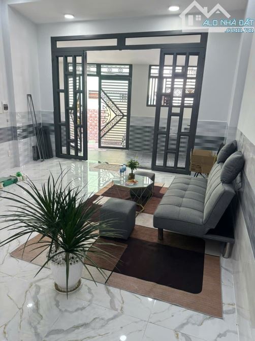Cần bán gấp nhà mới, hẻm xe hơi thông,  70m2,ngang 6m Bình Tân giáp q6, vị trí đẹp, 3.x tỷ - 2