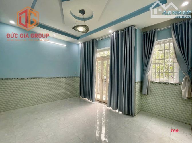 Cho thuê nhà mặt tiền đường N1 khu D2D P. Thống Nhất, 1 trệt 2 lầu 5x18m giá 20 triệu - 1
