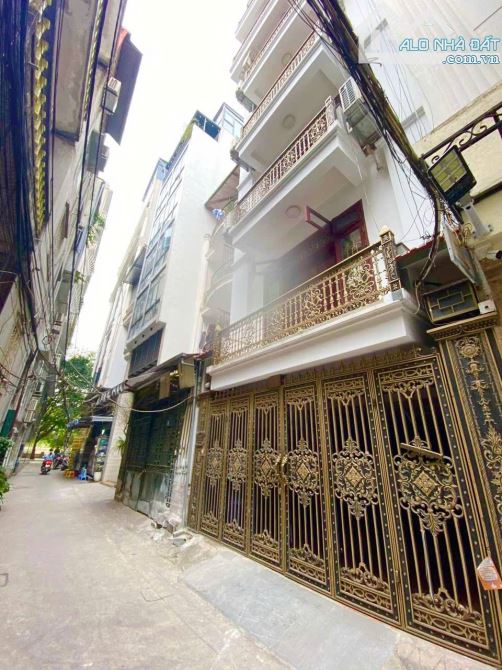 Chùa Láng – phân lô 7 tầng thang máy, 02 mặt ngõ ô tô đỗ.