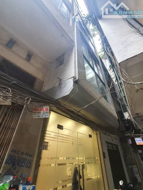 nhà kinh doanh đống đa  6,4 tỷ , dt 21m2 ,4 tầng, mt3,4m - 11