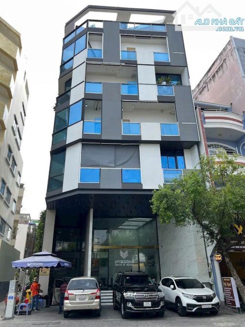 Bán toà nhà VP 2 MT 109 Hoàng Hoa Thám p7 Bình Thạnh.DT: 345m2 Hầm 7 tầng DTSD 2000m2 - 1