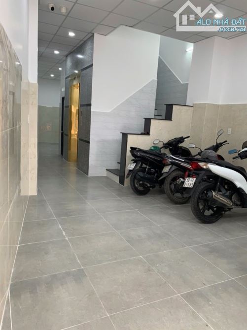 BÁN NHÀ TRỌ MTKD 6 TẦNG - THU NHẬP 40TR / THÁNG - CÓ THANG MÁY - 2