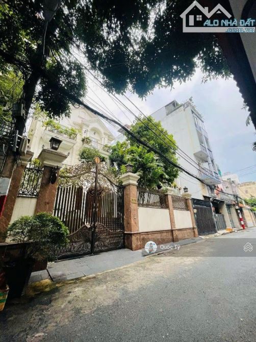 Bán biệt thự đường Bàu Bàng P13 Q. Tân Bình DT: 12m x 27m 1 hầm 4 lầu cực đẹp