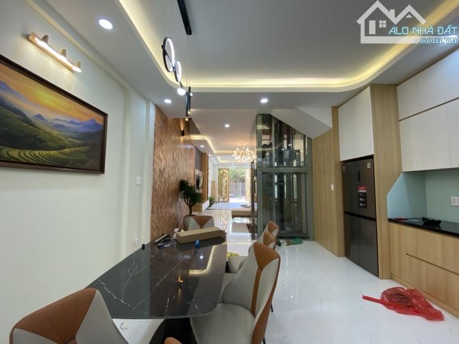 QUÀ TẬNG TÂN GIA- NHÀ MỚI 4TẦNG-4PN-THANG MÁY-ĐƯỜNG 12M-DÒNG TIỀN-CẬN PHÚ M HƯNG- QUẬN 7 - 1