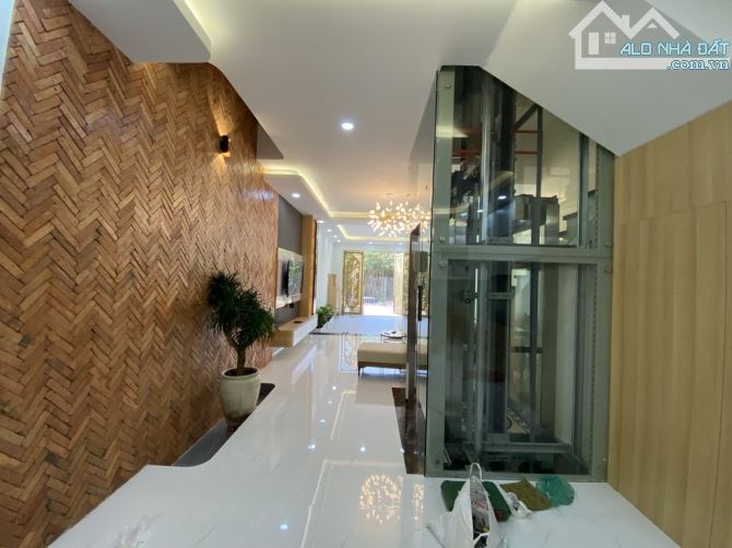 QUÀ TẬNG TÂN GIA- NHÀ MỚI 4TẦNG-4PN-THANG MÁY-ĐƯỜNG 12M-DÒNG TIỀN-CẬN PHÚ M HƯNG- QUẬN 7 - 4