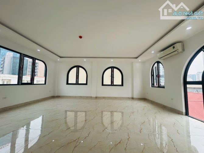 BÁN NHÀ NGÕ 62 NGUYỄN CHÍ THANH, Ô TÔ VÀO NHÀ, 7 TẦNG, THANG MÁY, 80m2, MT 8m 27,6 tỷ. - 1