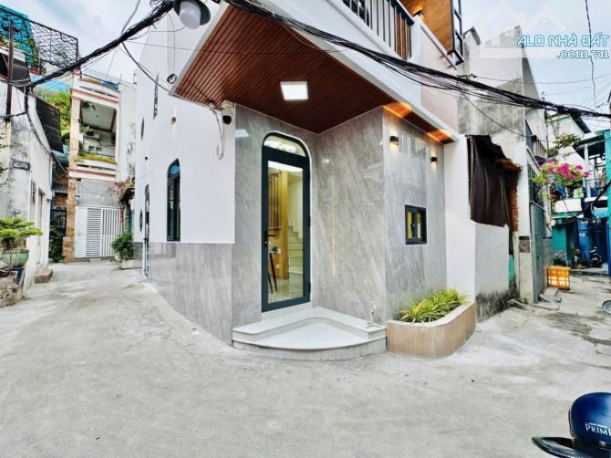 Căn góc đẹp hẻm 267/70 Bùi Đình Túy P.14 nhà đẹp,có phòng ngủ dưới đất - 1