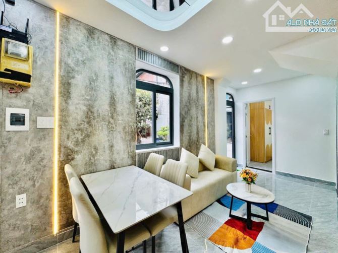 Căn góc đẹp hẻm 267/70 Bùi Đình Túy P.14 nhà đẹp,có phòng ngủ dưới đất - 2