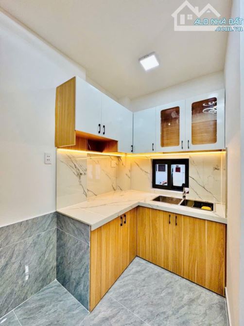 Căn góc đẹp hẻm 267/70 Bùi Đình Túy P.14 nhà đẹp,có phòng ngủ dưới đất - 4