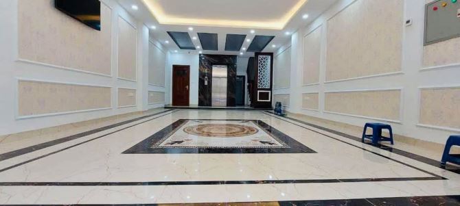 TOÀ VĂN PHÒNG TRUNG KÍNH CẦU GIẤY DT 100M 7 TẦNG THANG MÁY VỈA HÈ RỘNG KD ĐA DẠNG 48 TỶ - 1