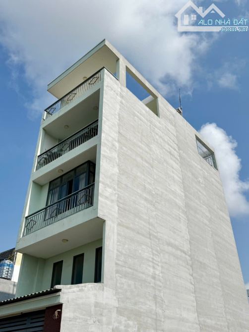 NHÀ ĐẸP 5 TẦNG 61m2 ĐƯỜNG 10m P. PHÚ HỮU - Ô TÔ NGỦ TRONG NHÀ