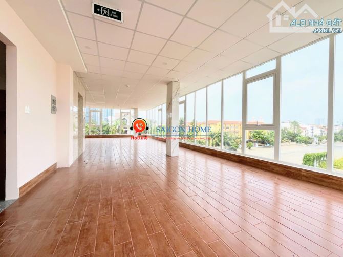 Cho thuê tòa văn phòng góc 2MT Trần Não,Quận 2 - 4