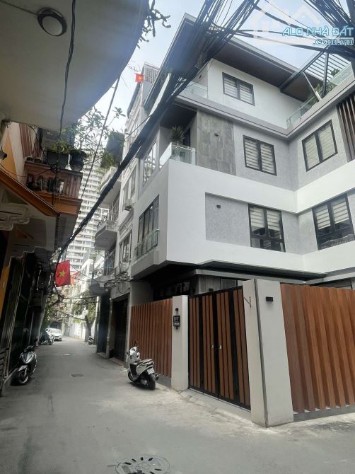 Bán nhà Phố Phùng Chí Kiên, mới 100% ôtô cất trong, thang máy, tặng nội thất xịn, 66M*6T