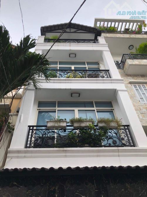 Bán nhà MT Nguyễn Trãi Q5 có hẻm sau 10m .( 4 x 20m ) 80m2 .  4 tầng giá 32,5 tỷ