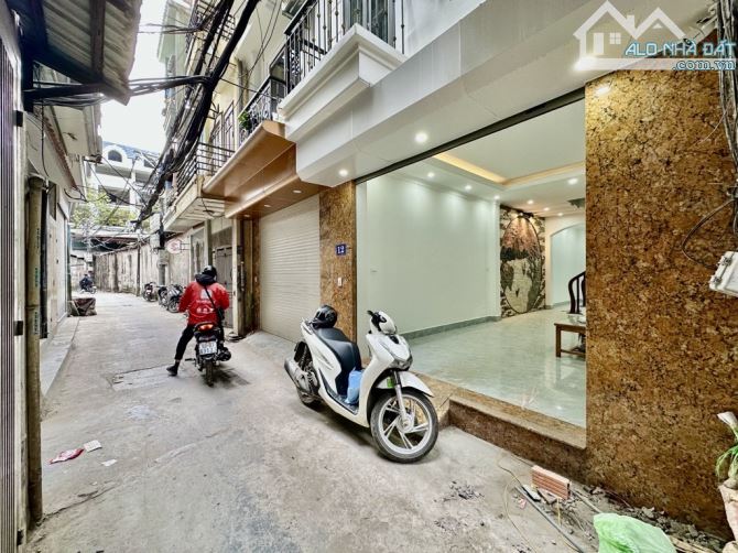 Nhà 5tầng phố Trần Thái Tông Trung tâm – Ngõ thông, ô tô đỗ cửa 45m.12ti100 - 1