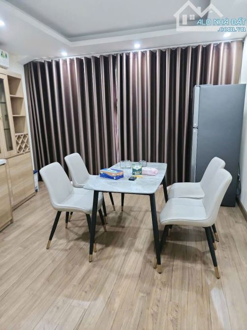 bán gấp nhà dòng tiền thu 70tr.thág phố xã đàn, quận đống đa, thang máy 60Mx7Tx5,6m 16 tỉ