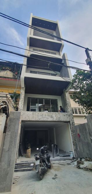 Bán nhà nguyễn văn cừ 101m2 xây 7 tầng , tháng máy , gara 2 xe ô tô , nội thất xịn sò