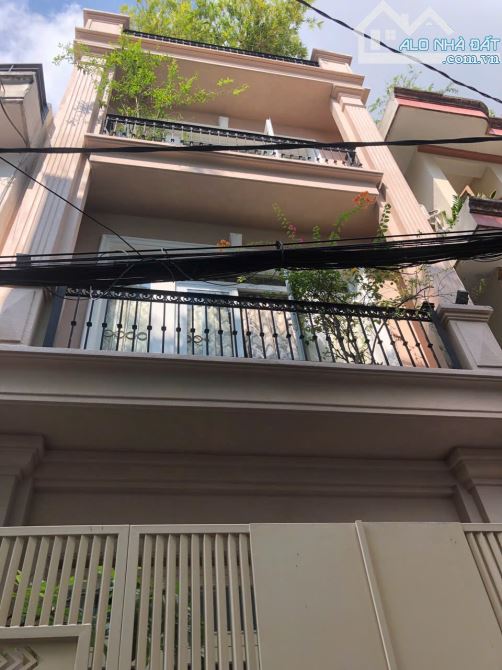 BÁN NHÀ HXH PHAN XÍCH LONG,P2.PHÚ QUẬN.4,8X14.NỞ HẬU 5,3M .4 TẦNG. GIÁ 13,5 CÒN 11,8 TỶ TL