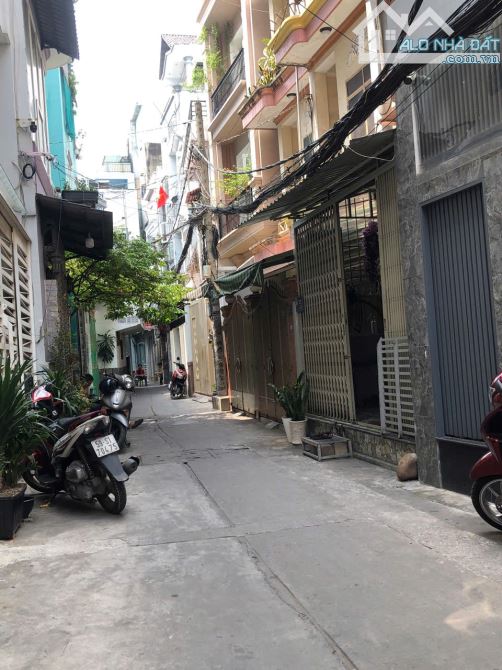 BÁN NHÀ HXH PHAN XÍCH LONG,P2.PHÚ QUẬN.4,8X14.NỞ HẬU 5,3M .4 TẦNG. GIÁ 13,5 CÒN 11,8 TỶ TL - 1