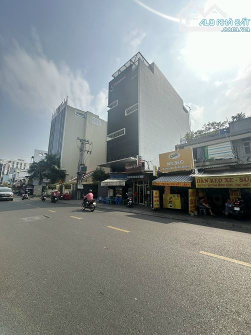 Toà Nhà Hầm 8 Tầng mặt tiền quận Bình Thạnh, 9.4x35m (nở hậu 19m), DTS: 2.400m2, 142 Tỷ - 1