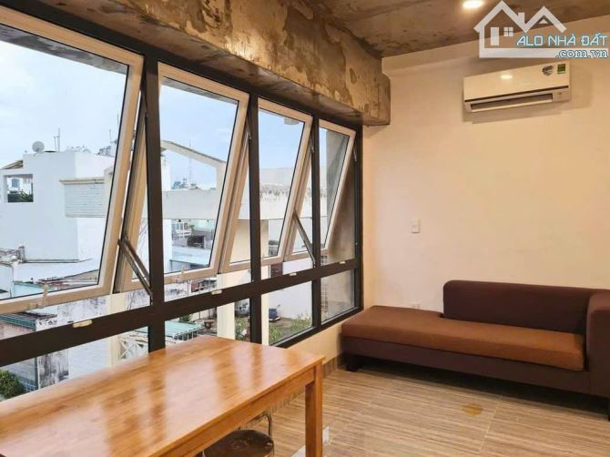 NGAY PHAN XÍCH LONG-HẺM XE HƠI 4 TẦNG 95M2-DÒNG TIỀN 60 TRIỆU/THÁNG-NGANG KHỦNG 5.8M - 1