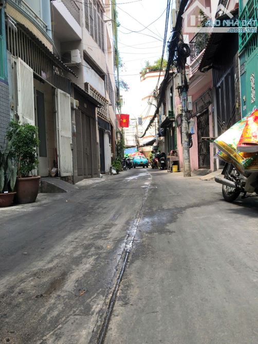 BÁN NHÀ HXH PHAN XÍCH LONG,P2.PHÚ QUẬN.4,8X14.NỞ HẬU 5,3M .4 TẦNG. GIÁ 13,5 CÒN 11,8 TỶ TL - 2