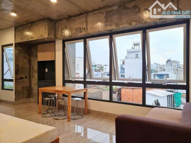NGAY PHAN XÍCH LONG-HẺM XE HƠI 4 TẦNG 95M2-DÒNG TIỀN 60 TRIỆU/THÁNG-NGANG KHỦNG 5.8M - 3