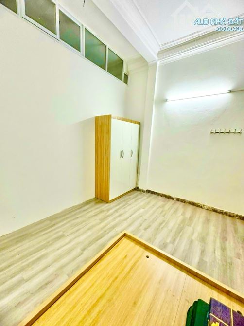 Bán nhà Dòng Tiền 200tr /năm.Dt:113m2 x 5 T.Ô tô đỗ Cổng.SĐV..Chỉ 12, tỷ 950tr.