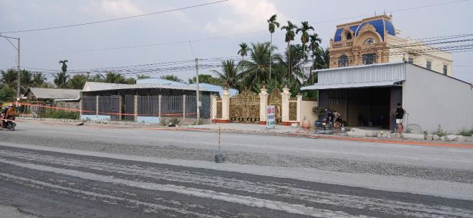 Bán 1000m2 đất đường lên cầu Rạch Miễu 2 Tiền Giang. Có 180m2 thổ cư. - 1