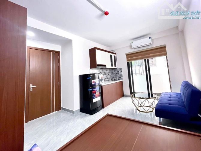 Nhà dòng tiền gần Ngã Tư Sở, 71m2, 7 tầng, 17 phòng, dt 100tr/tháng, lô góc, giá 18.3 tỷ - 2