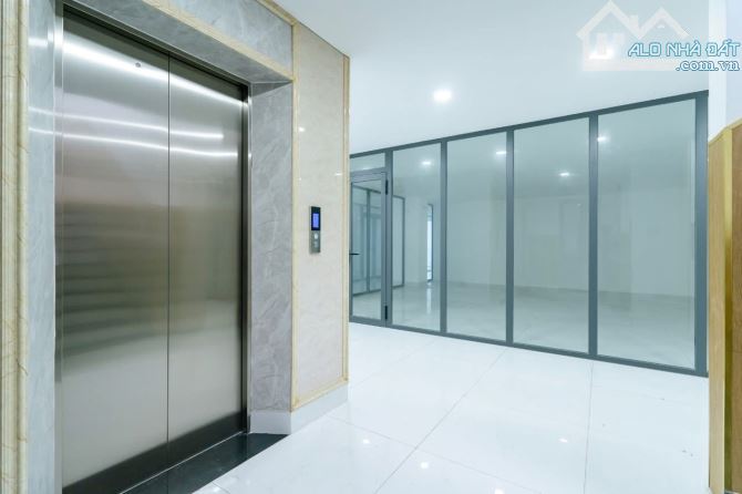 BÁN TOÀ NHÀ VĂN PHÒNG 7 TẦNG HÀ HUY GIÁP - 5