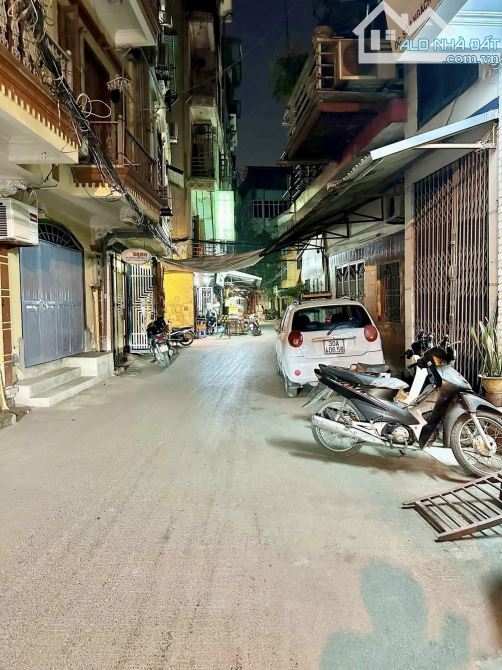 BÁN NHÀ LINH QUANG ĐỐNG ĐA 70m 7T Mt 5.5m GIÁ 21 TỶ THANG MÁY Ô TÔ TRÁNH KINH DOANH.