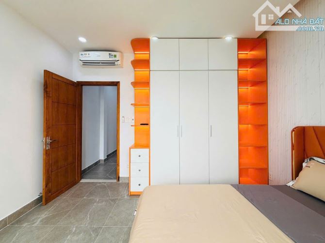 Bán nhà hẻm xe hơi đường Bùi Quang Là, P.12, 4 x 14, 4 tầng giá 6.4 tỷ tl - 24