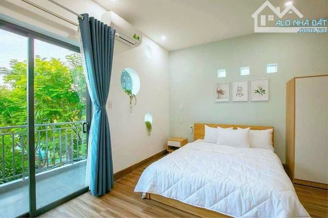 Toà căn hộ cao cấp 4 tầng Sông Hàn - Sơn Trà - Tp Đà Nẵng dòng tiền 50tr/tháng