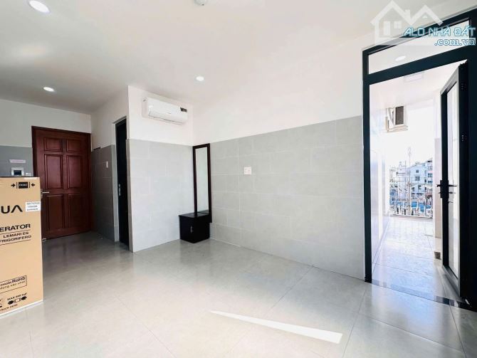 Bán tòa nhà 7 Tầng - 27 CHDV- đường Trần Tấn - ngay Âu Cơ, 6/14x27m, 30.9 tỷ. khoán 120tr - 1