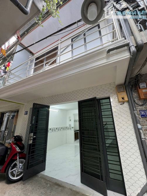 Nhà mới 2 tầng giá rẻ chỉ 2 tỷ 750 - Sổ hồng riêng quận 7 - 1