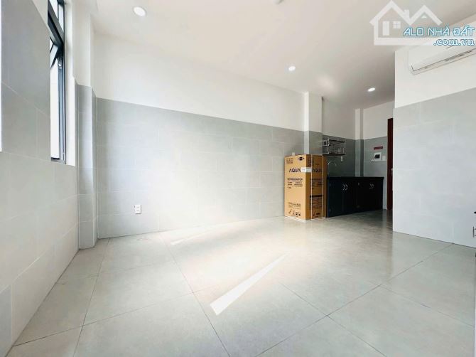 Bán tòa nhà 7 Tầng - 27 CHDV- đường Trần Tấn - ngay Âu Cơ, 6/14x27m, 30.9 tỷ. khoán 120tr - 2