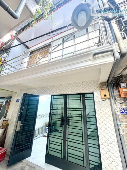 Nhà mới 2 tầng giá rẻ chỉ 2 tỷ 750 - Sổ hồng riêng quận 7 - 2