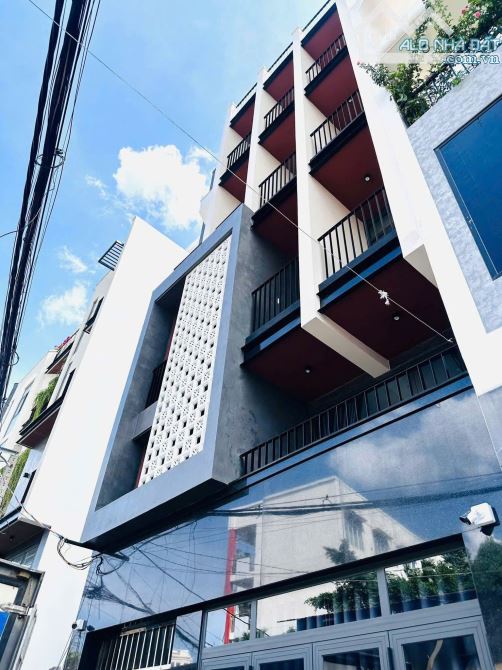 Bán tòa nhà 7 Tầng - 27 CHDV- đường Trần Tấn - ngay Âu Cơ, 6/14x27m, 30.9 tỷ. khoán 120tr - 4